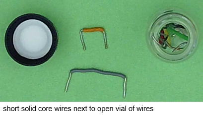 vial of short solid core wires