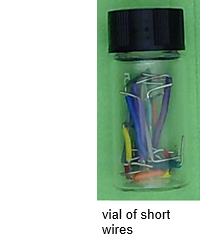 vial of short solid core wires